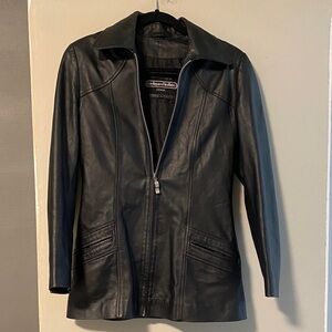 Sleek Black Leather Jacket vintage